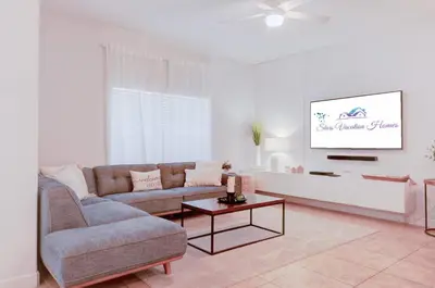 a living room with a couch and a table at 8937CP-SVH in Kissimmee