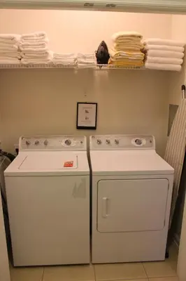 a kitchen with a white stove and a dishwasher at Viz Cay Apartment 202 in Orlando