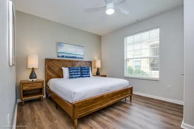 a bedroom with a bed and a window at Casa Magna Condo #152742 in Orlando