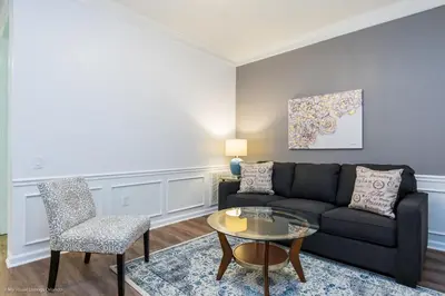 a living room with a couch and a table and chairs at Casa Magna Condo #152742 in Orlando