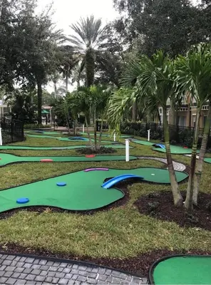 a bunch of miniature golf courses in a park at Margaritavilla at Emerald Island in Kissimmee