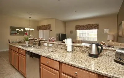 a kitchen with a sink and a counter top at Dog-Friendly Townhome Wsplashpool -3201Pp in Kissimmee