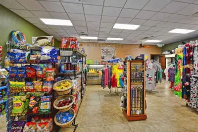 a grocery store aisle with a lot of products at Close To Clubhouse, Bbq, Wifi-3001Ppr in Kissimmee