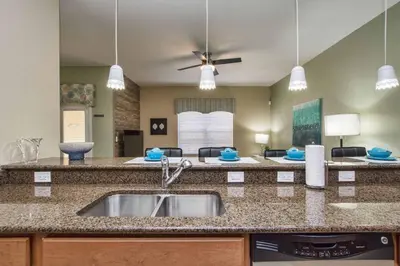 a kitchen with a sink and a counter top at Pvt Splashpool, Bbq Grill, Close To Parks-3057Pp in Kissimmee