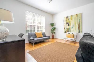 a living room with a couch and a chair at Wonderful Apt Convention Center VistaCay VC50253 in Orlando