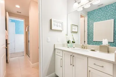 a bathroom with a sink and a mirror at Gorgeous Home With Private Pool, Themed Rooms Near Disney With Waterpark & Resort Access At Encore Resort - 7687Ff in Kissimmee