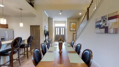 a conference room with a long table and chairs at 6 Bed, 4 Bath perfect for group or large family in Oviedo