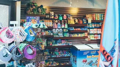 a store with a shelf of toys and other items at Holiday Inn Club Vacations At Orange Lake Resort in Orlando