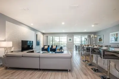 a large living room with a large couch and chairs at Calistoga Avenue Villa #259830 Villa in Kissimmee