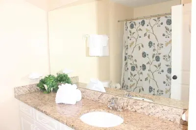 a bathroom with a sink and a shower at Lindfields Reserve #267170 Villa in Kissimmee