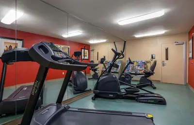 a gym with several exercise bikes in a room at Extended Stay America Suites - Orlando - Maitland - 1776 Pembrook Dr in Orlando
