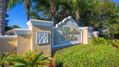 a sign for the walt disney palms resort at Rhapsody Palms - Family 4-bed pool home that's close to Disney in Kissimmee