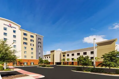 a rendering of the front of a hotel at Candlewood Suites - Orlando - Lake Buena Vista by IHG in Orlando