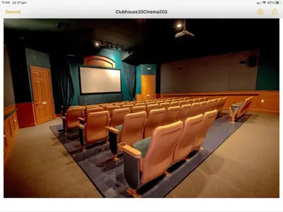 an empty lecture hall with chairs and a screen at Mickey Holiday Home a Windsor Palms Villa in Kissimmee