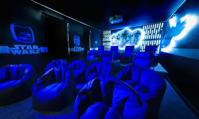 a star wars room with blue lights and chairs at B - New 4 Bedroom Home - 5 Miles to Disney - Free Water Park - Private Pool in Kissimmee