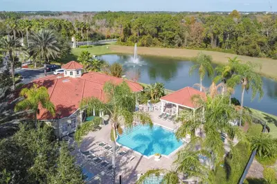 an aerial view of a house with a swimming pool at Palm Key Villa 7 bed on Emerald Island Resort in Kissimmee