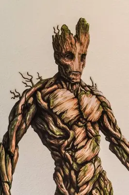 a drawing of a baby groot on a wall at H - New 2 Bedroom Condo - 5 Miles to Disney - Free Water Park in Kissimmee