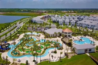 an aerial view of the pool at the resort at H - New 2 Bedroom Condo - 5 Miles to Disney - Free Water Park in Kissimmee