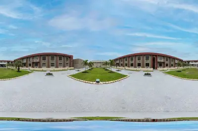 an image of a building with a courtyard at OYO Hotel Orlando Airport in Orlando