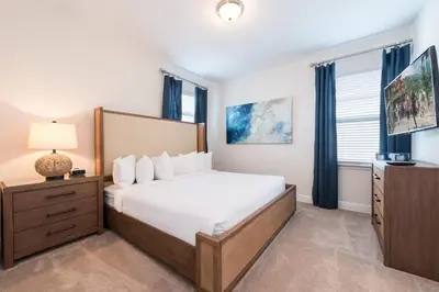 a bedroom with a bed and a dresser and window at Lovely Home With Private Pool And Air Hockey Table Near Disney With Waterpark & Resort Access At Encore Resort - 7467Mr in Kissimmee