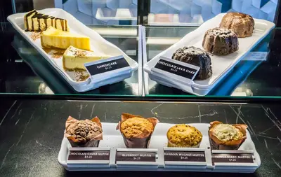 a display case with two trays of different desserts at Hyatt Place Orlando/Lake Buena Vista in Orlando