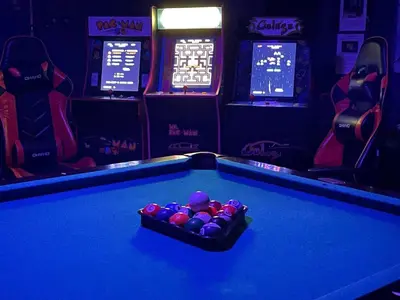 a pool table with balls in a billiard room at My Disney Castle in Orlando