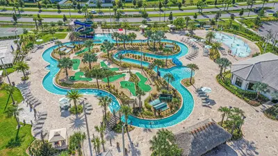 an aerial view of a water park at a resort at Only 5 Miles from Disney! Free Water Park! 2 Bed, 2 Bath Condo, Sleeps 8 in Kissimmee