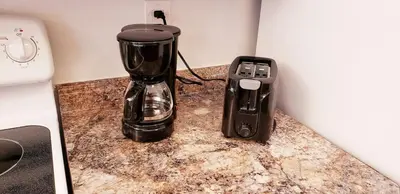 a coffee maker and a blender sitting on a counter at D4 Large Private Master Room & Bath with 55