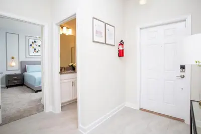 a room with a door and a bedroom with a bed at Gorgeous 4 Bedroom w/ Pool Close to Disney 4836 in Kissimmee
