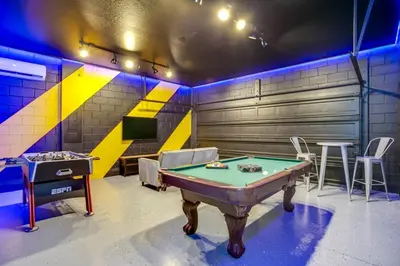 a room with a pool table and a garage at Jedi Temple! Take A Virtual Tour Private Pool! Villa in Orlando