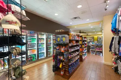 a store aisle with a lot of products at Rosen Inn Closest to Universal in Orlando