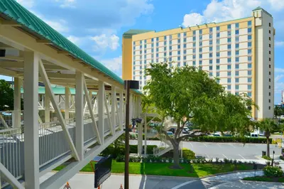 a view of a hotel with a building in the background at Rosen Plaza Hotel Orlando Convention Center in Orlando