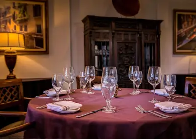 a table with wine glasses and napkins on it at Rosen Shingle Creek Universal Blvd in Orlando