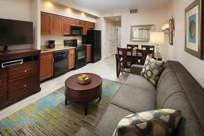 a large living room with a couch and a table at Sheraton Vistana Resort Villas, Lake Buena Vista Orlando in Orlando