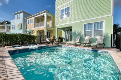 a swimming pool in front of a house at Smooth Sailing Cottage With Private Pool Near Disney And Margaritaville Resort & Island H20 Waterpark Access - 7992Sh in Orlando