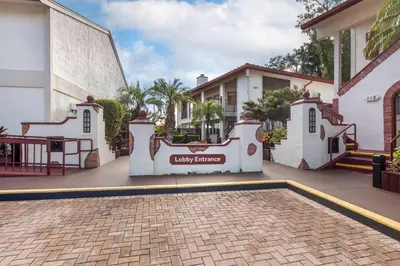 a house with a sign that reads lucky brothers at Bryan's Spanish Cove in Orlando