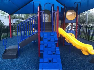 a playground with a slide in a park at 13-403 Your Vista Cay Home in Orlando