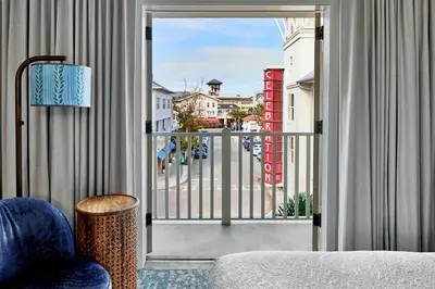 a room with a window with a view of a street at The Inn at Celebration, Autograph Collection in Orlando