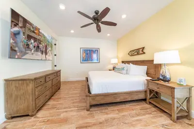 a bedroom with a bed and a ceiling fan at Blissful Oasis With Private Pool Near Disney With Margaritaville Resort & Island H2O Access - 8057Su in Orlando