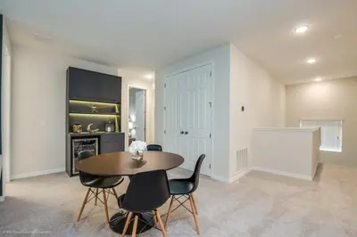 a dining room with a table and chairs at Solara Resort 9 Bedroom 6 Bathroom Resort Villa Villa in Orlando