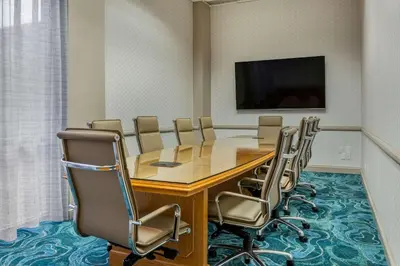 a conference room with a table and chairs at Wyndham Lake Buena Vista – Disney Springs® Area in Orlando
