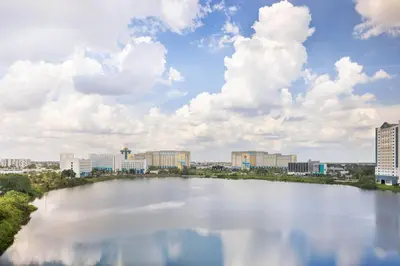 a large body of water with buildings in the background at Ramada Plaza by Wyndham Orlando Resort & Suites Intl Drive - Newly Renovated! in Orlando