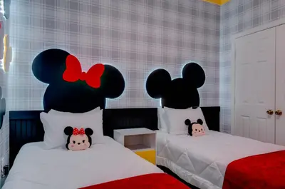 two beds in a room with two stuffed animals on them at 2785AL-SVH Brand New Apartment! in Orlando
