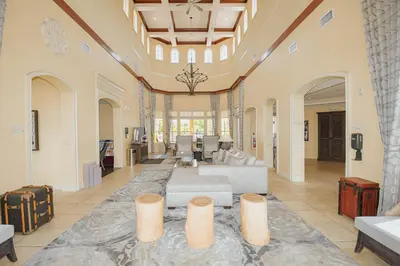 a large living room with a couch and a table at WorldQuest Orlando Resort in Orlando