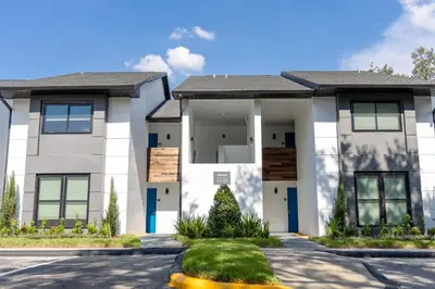 a large white house with a driveway at Legacy Vacation Resorts - Disney and Lake Buena Vista in Orlando