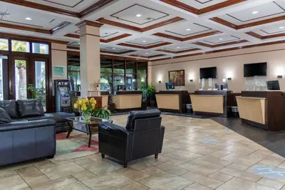 a waiting room at a hospital with couches and tables at Legacy Vacation Resorts Kissimmee & Orlando - Near Disney in Kissimmee
