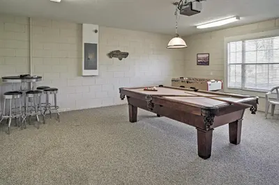 a pool table in a room with a bar at 4 Mi to Disney Kissimmee Group Getaway in Orlando