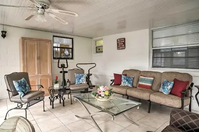 a living room with a couch and chairs and a table at Spacious Central Florida Home Family Friendly! in Orlando