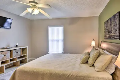 a bedroom with a bed and a ceiling fan at Clermont Home with Pool and Game Room 10 Mi to Parks! in Orlando