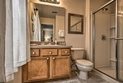 a bathroom with a sink and a toilet and a shower at 4 Mi to Animal Kingdom Gem with Pool in Kissimmee in Kissimmee